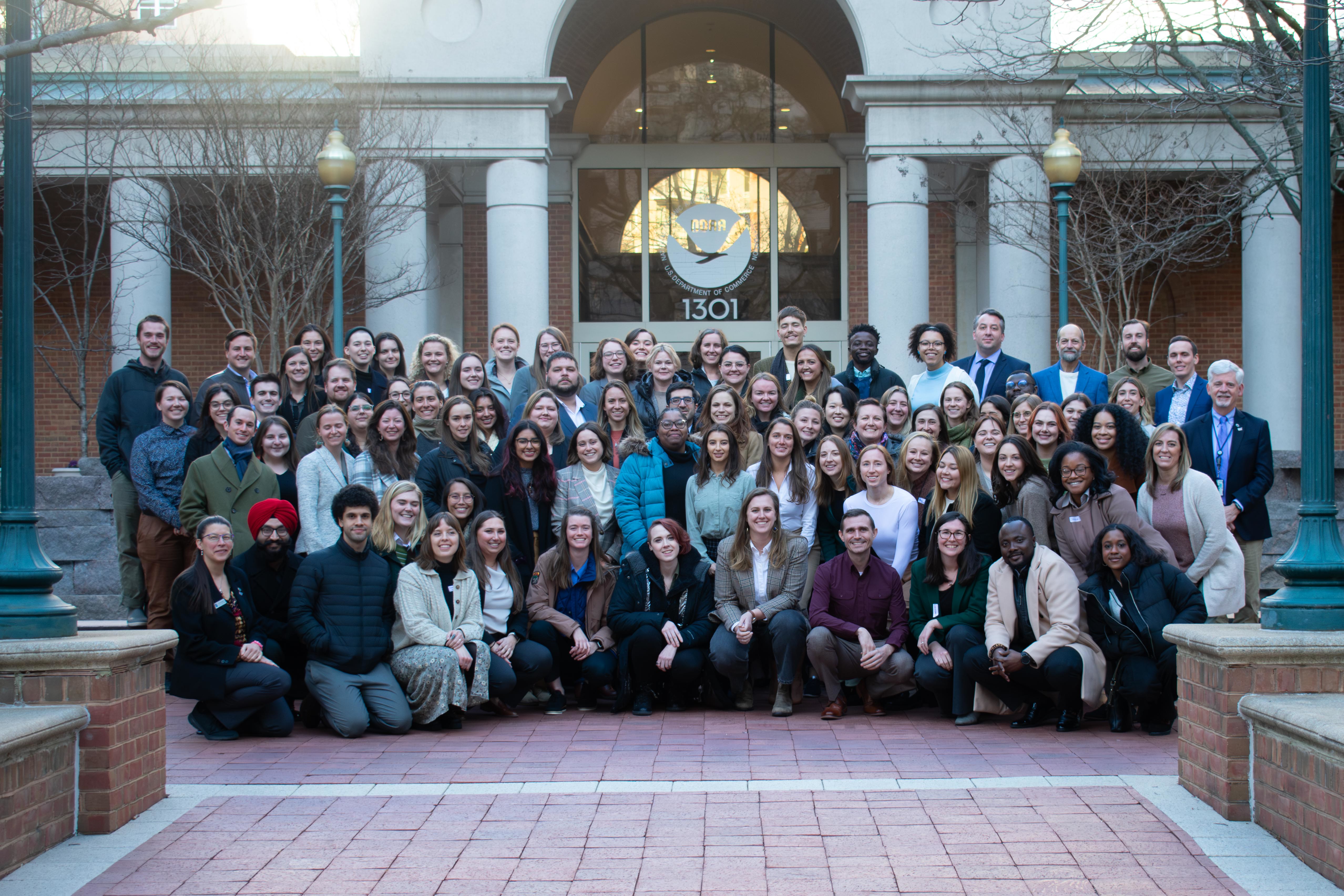 The 2024 Knauss Fellows smile for a group photo. Erik Simula is fourth from the right of the top row.