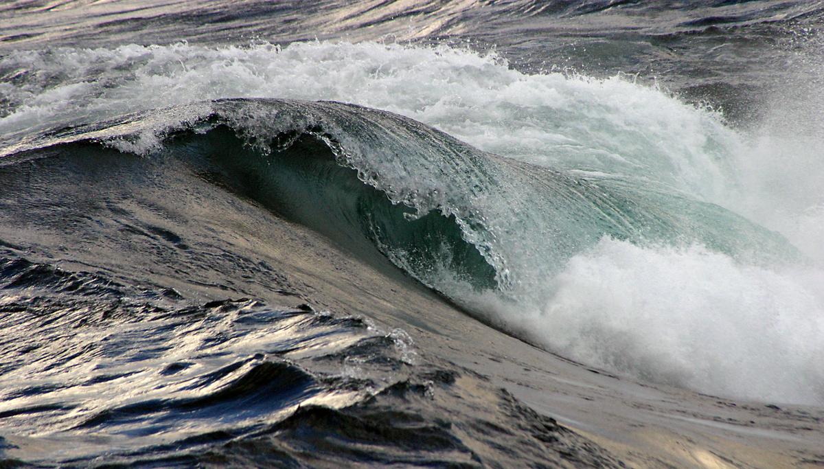 A blue wave curling in on itself. 